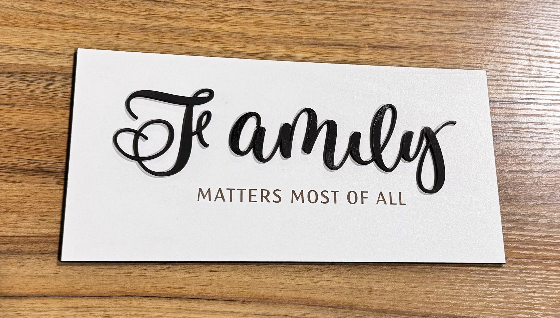 a white card with a black lettering that says stanleys matters most of all