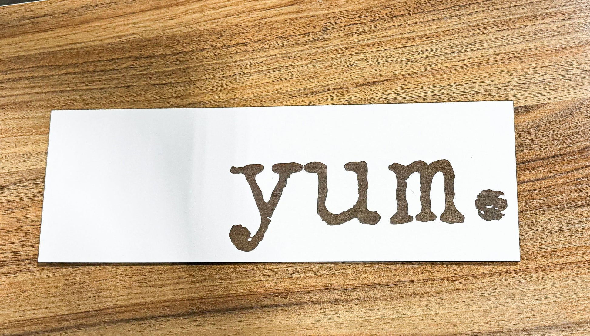 a piece of paper with the word yum written on it
