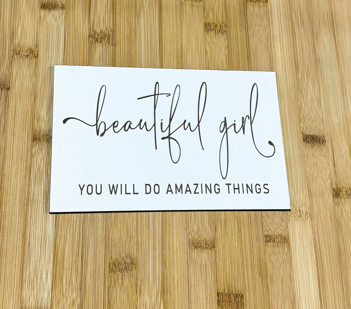a piece of paper that says, beautiful girl you will do amazing things