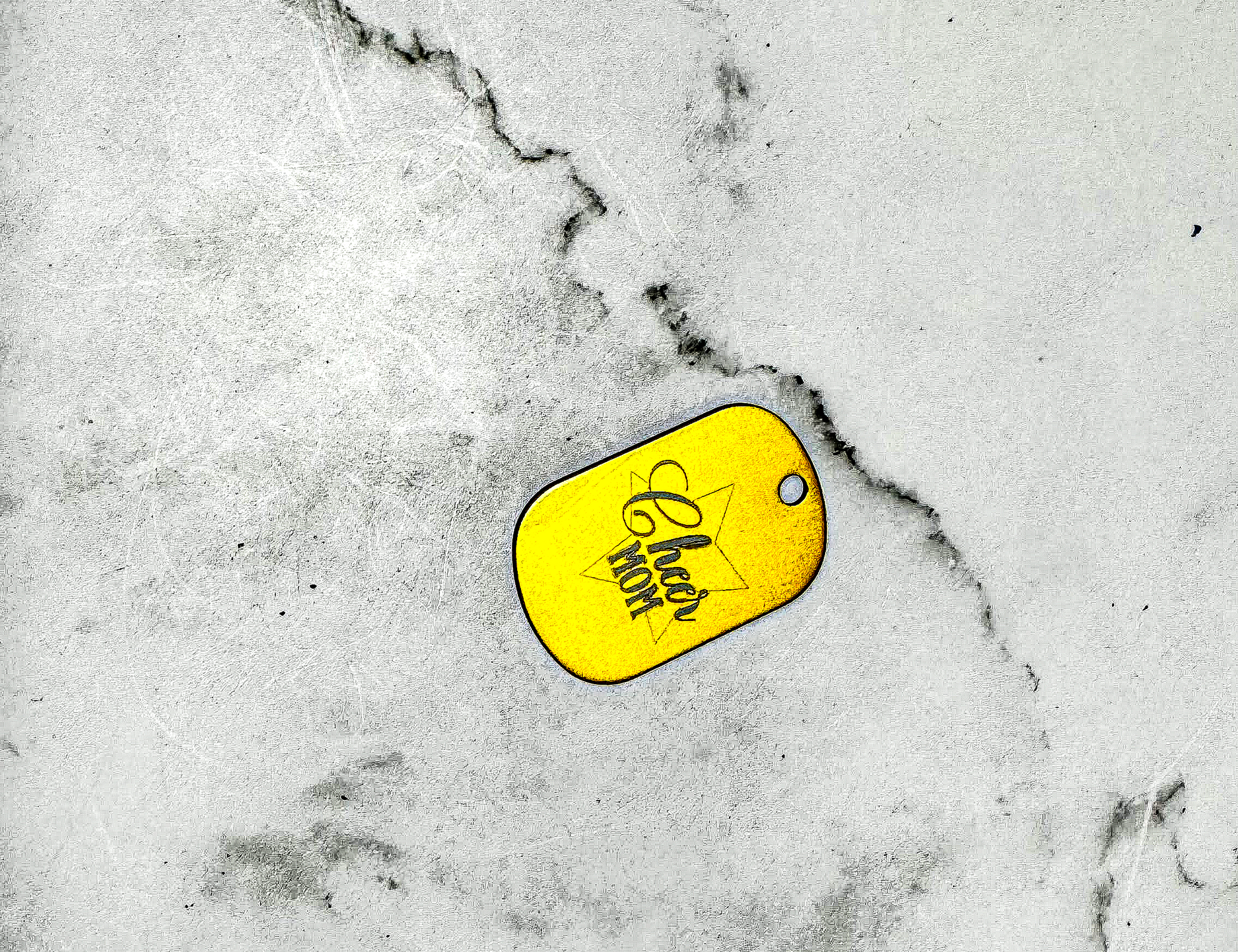a yellow tag that is on the ground