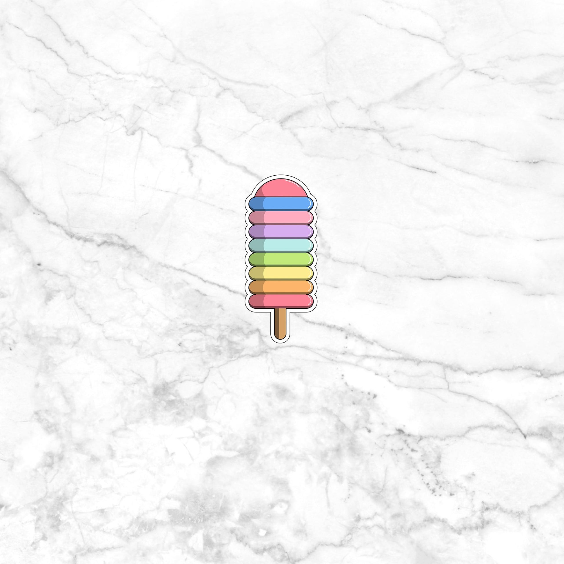 a colorful popsicle sticker on a marble background